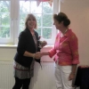 Sally Cox receiving the Elsie Bowl for Tastiest in Show for her plum jam