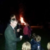 Village children enjoying the bonfire with Daddy
