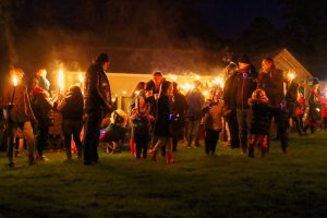 Gathering to light the bonfire