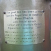 The plaque on the pillar box