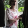 Rose continues with her talk while we shelter in the Chinese summerhouse