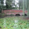 The river going under the road bridge