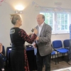 Sheila Sorby receiving the Stoodley Cup from Judge Ray for the Highest Number of Points Achieved in the Show