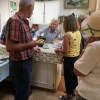 Mrs Jenny Jowett serving tea in her kitchen